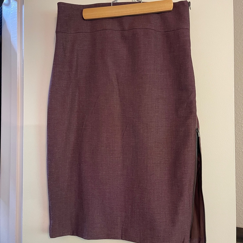 skirt, maroon/ burgundy color with tags on from Express. Size 8